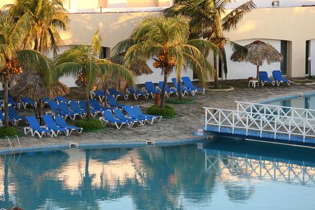 hotel swimming pool in cuba by sunrise