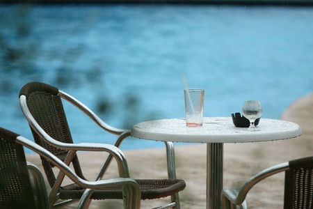 rain by the hotel and swimming poolの写真素材