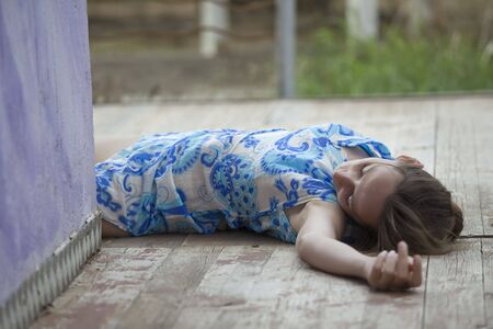 unconscious womanの写真素材