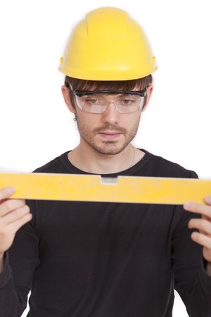 manual worker with level on white background