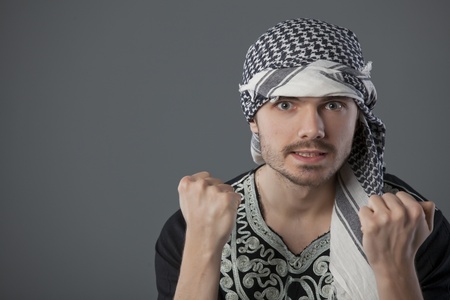 agnry palestinian man showing both fists in the cameraの写真素材