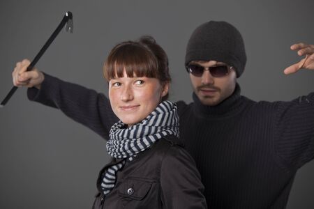 woman do not scent a danger from thief with crowbar