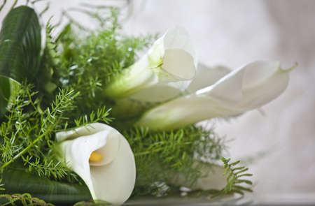 wedding bouquet on the table, bride in backgroundの写真素材