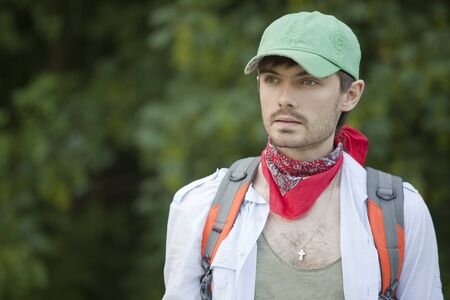 portrait of hiker with backpack on the wayの写真素材