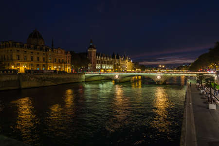 Street on the waterfront of Paris by night in summerの写真素材