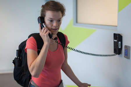 the young woman has been complaining to the airport by telephone