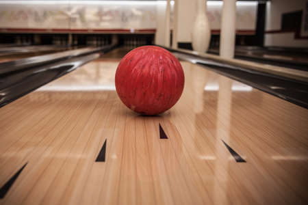 The bowling ball is ready to strikeの写真素材