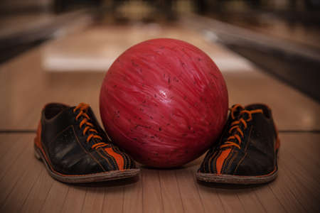 The bowling ball is ready to strike