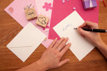 young woman preparing gifts for their loved ones at the party moments