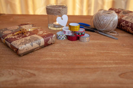 young woman preparing gifts for their loved ones at the party momentsの写真素材