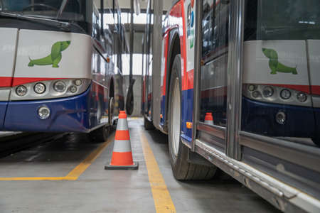 Buses and trams in the depot for servicing and preparation for driving around town