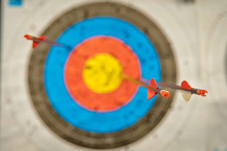 target and darts at the archery competition in the sports hallの写真素材
