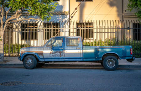 old rusted van on city streetの写真素材