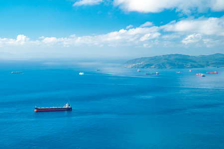 Cargo ship on the open sea, panorama.の写真素材