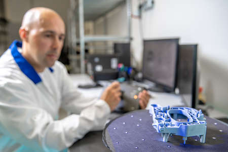 technically professional machine for 3D scanning and measurement of plastic moldings using a laserの写真素材