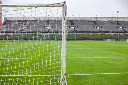 soccer gate on green grassy field.