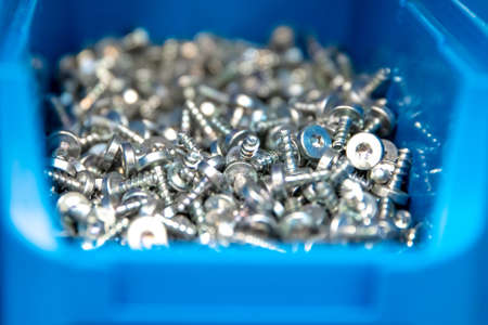 screws in blue box for joining materials.