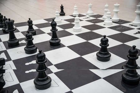 mannequins from chess game on black and white squaresの写真素材