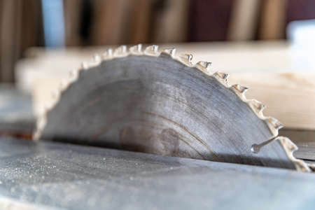 toothed metal blade on circular saw in joineryの写真素材