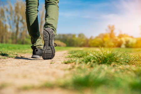 tourist walking along a hiking trail. copy space