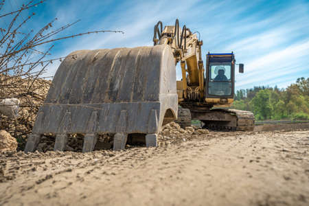 excavator parked on the construction site.