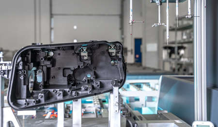 3D measuring device in a factory for the production of plastic castings for the automotive industry.