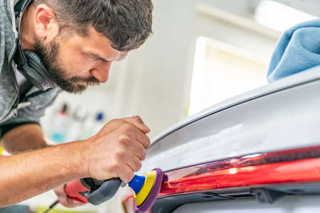 shine restoration and repair of scratches on car taillights with the help of polishing