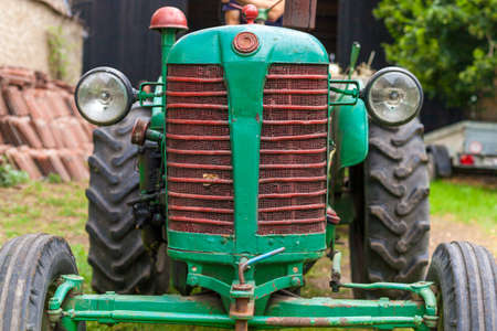 old tractor on a farm as a work tool
