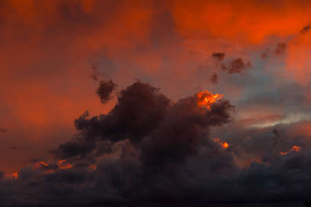 sunset plays with colors in the sky and clouds