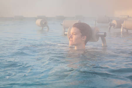 relax in the winter whirlpool in the wellnessの写真素材