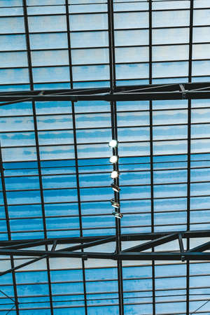 lights on a building metal structure with a window