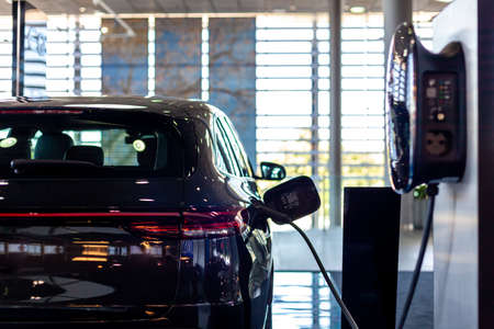 charging the car with electricity at the station