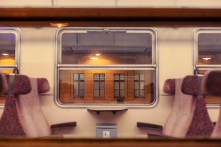 view through the window of a night train at the stationの写真素材