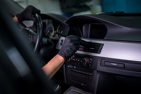 manual cleaning of the car interior with the help of brushingの写真素材