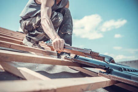 ceramic roof tiles in a new buildingの写真素材