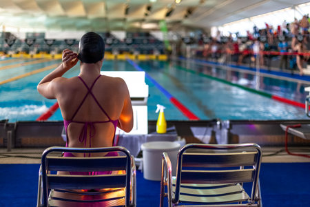 swimmer in the pool prepares for the competitionの写真素材