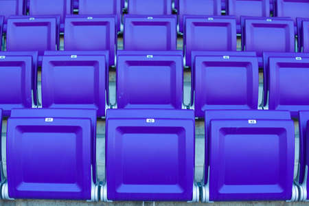 empty seats without spectators in the stadiumの写真素材