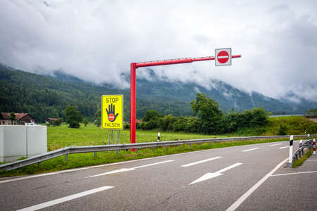 traffic signs stop on the highway prohibiting driving in the opposite directionの写真素材