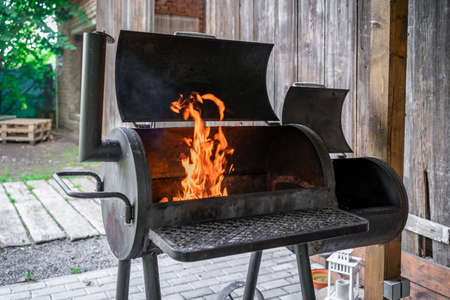 outdoor grill with fire before barbecueの写真素材