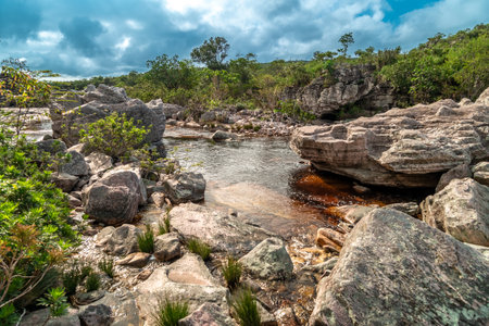 A mountain river flows through rocks in South Americaの写真素材