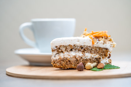 carrot cake and a mug of coffee on a wooden tray