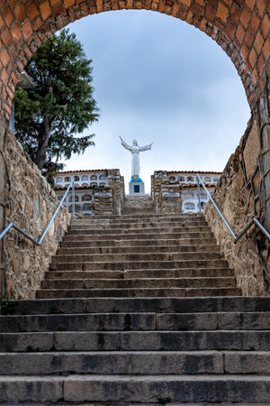 Yungay, Peru - September 16.2022: Statue of Christ in a cemetery in the city of Yungay under Mount Huascaran in Peruのeditorial素材