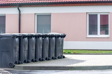 containers for mixed waste in the villageの写真素材