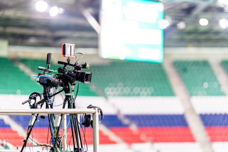 professional video camera broadcasting a football matchの写真素材