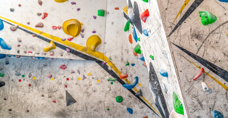 artificial climbing wall with colorful holds