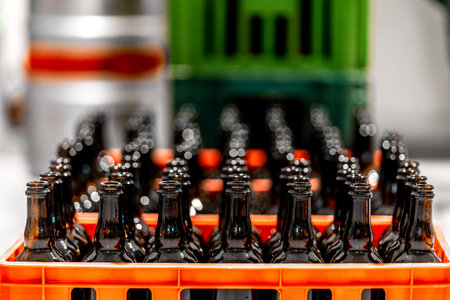 empty beer bottles in breweryの写真素材