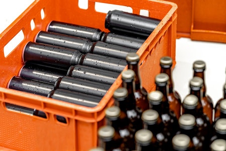 beer bottles and beverage cans in the brewery warehouseの写真素材