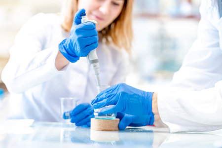 students of the science faculty will conduct chemical research in the laboratory