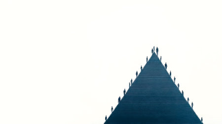 Business people climbing a huge staircase to successの素材