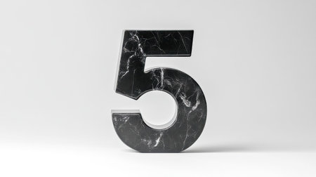Black marble number five on white background representing rating and scoreの素材